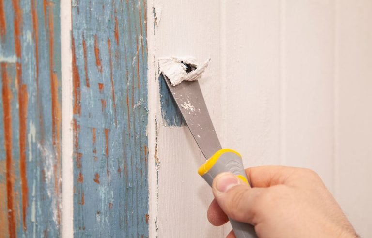 Scraping off old paint