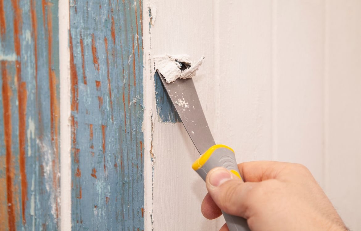 Scraping off old paint