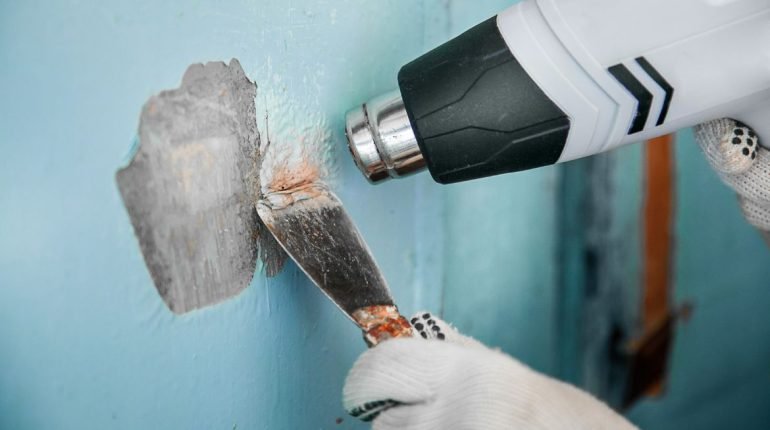 Using heat gun to remove old paint (2)