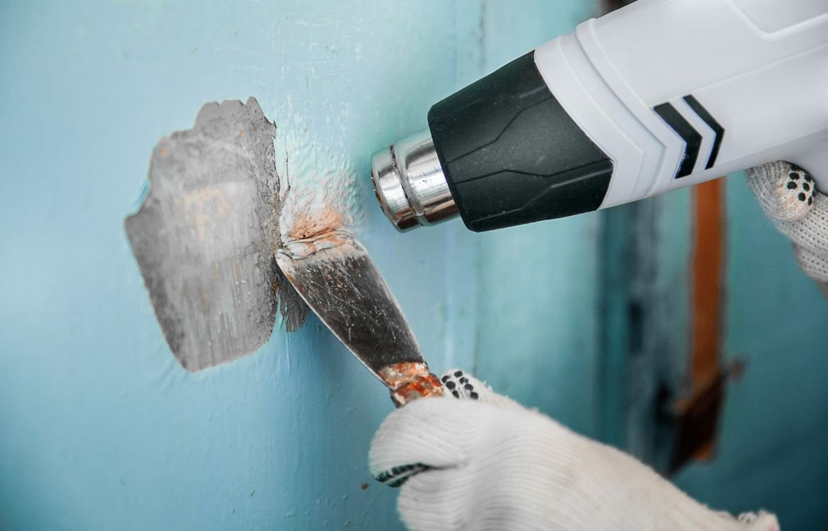 Using heat gun to remove old paint (2)
