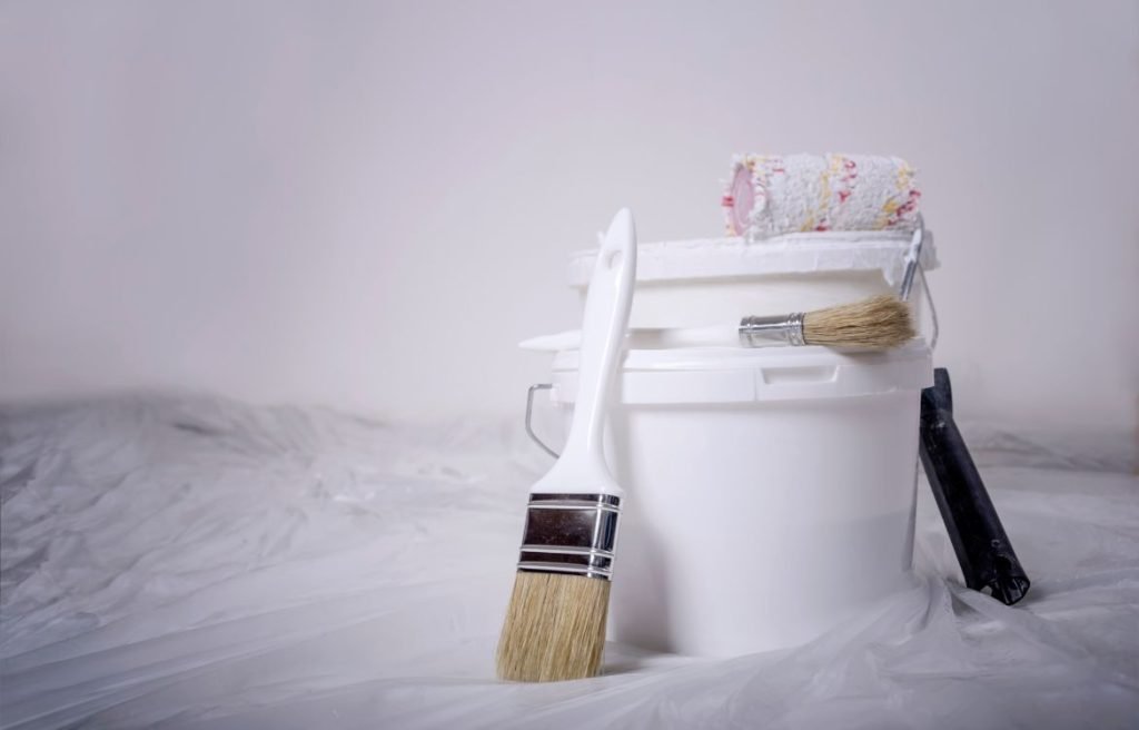 Painting tools on a drop cloth